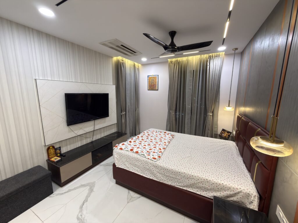 Simple bedroom design with a comfortable bed, minimal furniture, and modern interior décor.