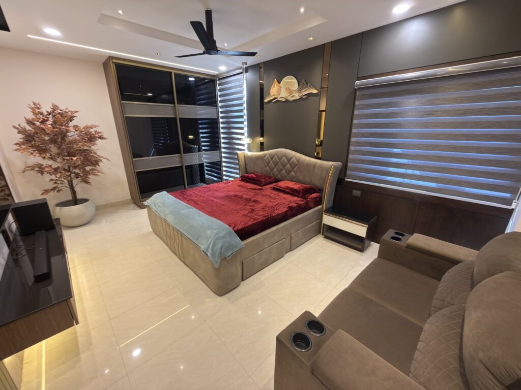 Master bedroom with comfortable bed and contemporary interior design.