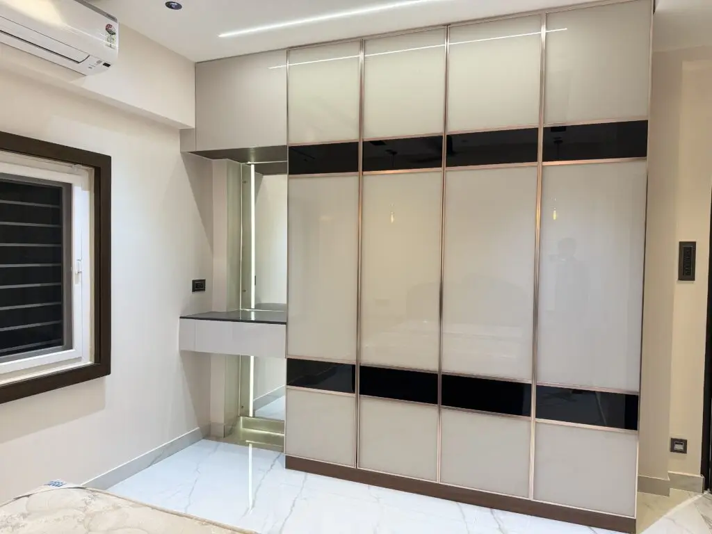 Custom Wardrobe Design for Indian Homes 4 Modern storage unit with built-in cabinets, shelves, and contemporary design