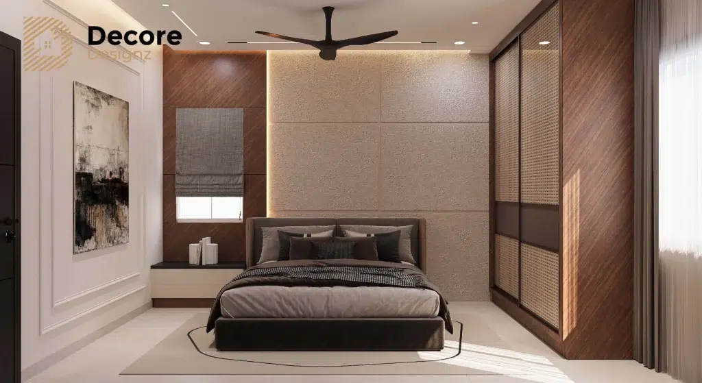 3 BHK Front view of a modern bedroom featuring built-in cupboards, storage units, and a floor-to-ceiling wardrobe