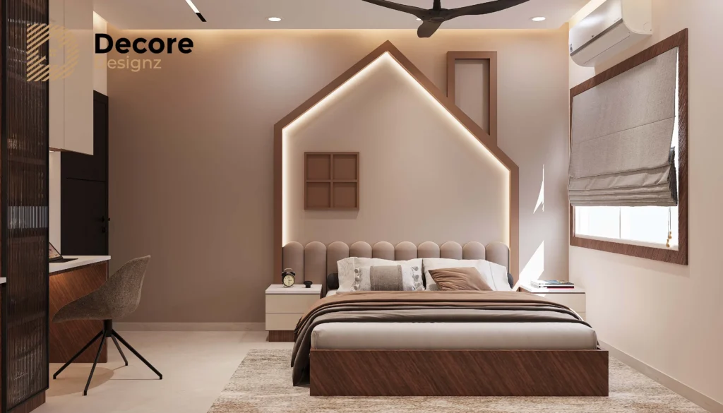 3 BHK Front view of a modern living room with a TV unit, built-in study desk, overhead cabinets, open shelves, and contemporary seating in neutral tones.